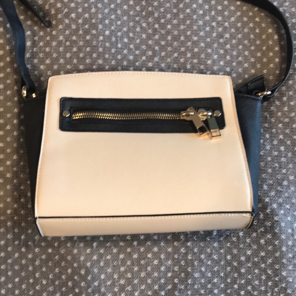 Cream and black purse